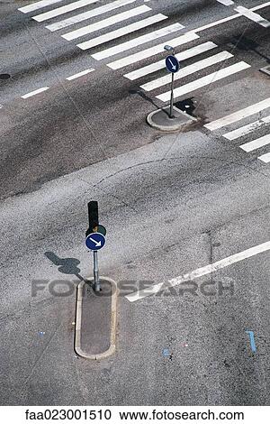 Crosswalk and traffic arrows, high angle view View Large Photo Image Stock Image - Crosswalk and traffic arrows, high angle view. Fotosearch