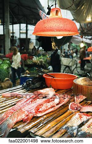 Cut up fish in market stall View Large Photo Image Stock Photo - Cut up fish in market stall. Fotosearch