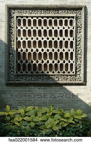 Picture - Decorative square vent in wall. Fotosearch