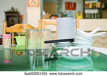 Dishes on table View Large Photo Image Stock Photography - Dishes on table. Fotosearch