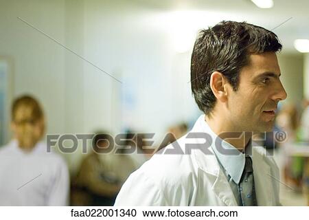 Doctor, hospital waiting room in background View Large Photo Image Stock Image - Doctor, hospital waiting room in background. Fotosearch