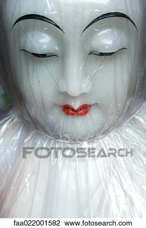 Doll face under cellophane View Large Photo Image Stock Image - Doll face under cellophane. Fotosearch