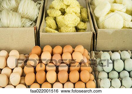 Eggs and noodles for sale in market View Large Photo Image Stock Photograph - Eggs and noodles for sale in market. Fotosearch