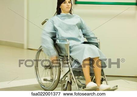 Female patient using wheelchair, blurred motion View Large Photo Image Stock Photo - Female patient using wheelchair, blurred motion. Fotosearch