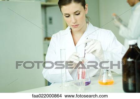 Female scientist working in laboratory View Large Photo Image Picture - Female scientist working in laboratory. Fotosearch