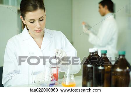 Female scientist working in laboratory View Large Photo Image Stock Image - Female scientist working in laboratory. Fotosearch
