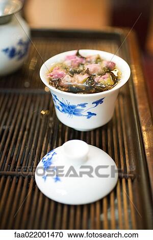 Flowers steeping with tea View Large Photo Image Stock Image - Flowers steeping with tea. Fotosearch