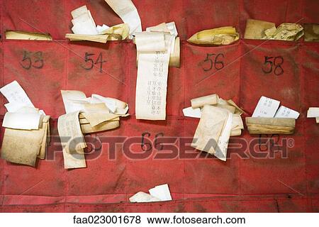 Stock Photo - Fortune slips in Chinese temple, close-up. Fotosearch