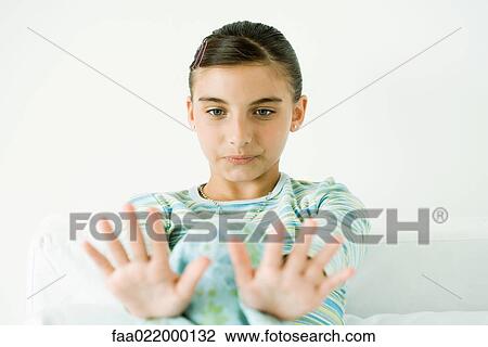 Girl letting nails dry View Large Photo Image Stock Image - Girl letting nails dry. Fotosearch