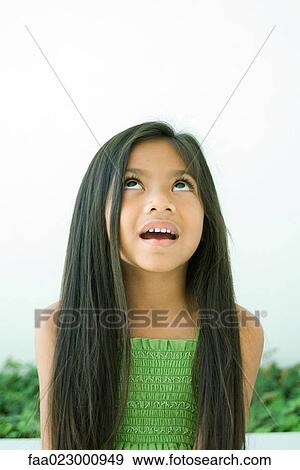 Girl looking up, open mouth, portrait View Large Photo Image Stock Photo - Girl looking up, open mouth, portrait. Fotosearch