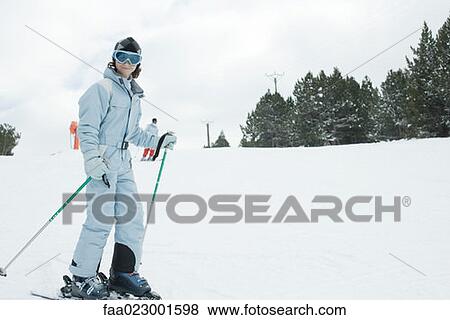 Stock Photo - Girl skiing. Fotosearch