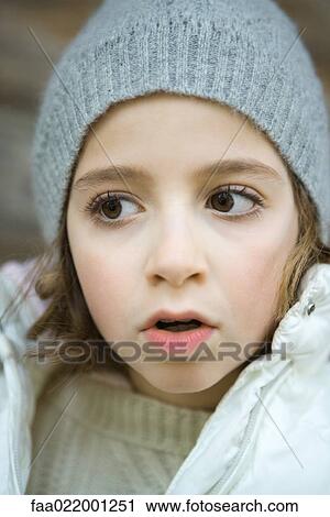 Girl wearing winter clothes, close-up, portrait View Large Photo Image Stock Image - Girl wearing winter clothes, close-up, portrait. Fotosearch