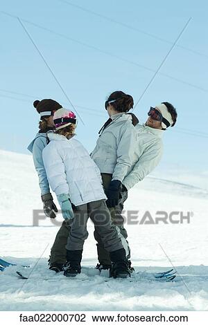 Group having fun in snow, full length View Large Photo Image Stock Image - Group having fun in snow, full length. Fotosearch