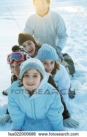 Group having fun in snow, portrait View Large Photo Image Stock Photograph - Group having fun in snow, portrait. Fotosearch