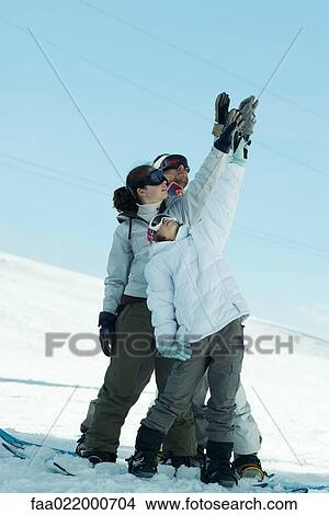 Group of snowboarders posing in snow, full length View Large Photo Image Picture - Group of snowboarders posing in snow, full length. Fotosearch