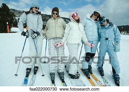 Stock Image - Group of young skiers, full length, portrait. Fotosearch