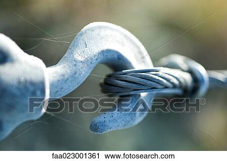 Hook connected to rope, covered with spiderwebs View Large Photo Image Stock Image - Hook connected to rope, covered with spiderwebs. Fotosearch