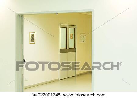 Stock Photography - Hospital corridor, view through doorway. Fotosearch