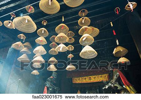 Incense hanging from ceiling in Chinese temple View Large Photo Image Stock Photography - Incense hanging from ceiling in Chinese temple. Fotosearch
