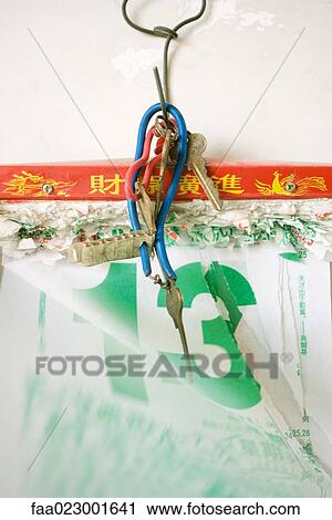 Keys hanging over number thirteen View Large Photo Image Stock Image - Keys hanging over number thirteen. Fotosearch