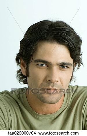 Man looking at camera, portrait View Large Photo Image Picture - Man looking at camera, portrait. Fotosearch