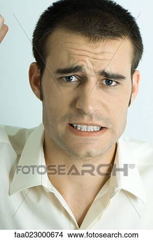Man making face, portrait View Large Photo Image Picture - Man making face, portrait. Fotosearch