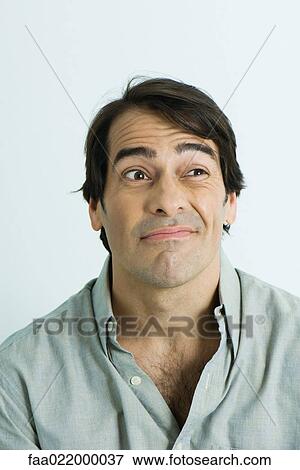 Man making face, portrait View Large Photo Image Stock Photo - Man making face, portrait. Fotosearch