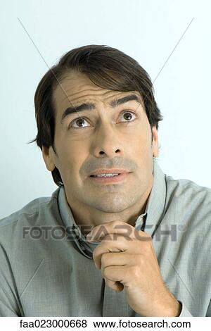 Stock Photo - Man making face, portrait. Fotosearch