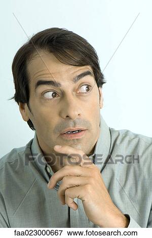 Man showing surprise, portrait View Large Photo Image Stock Photo - Man showing surprise, portrait. Fotosearch