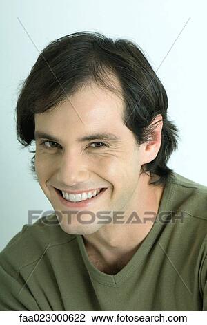 Man, smiling at camera, portrait View Large Photo Image Stock Image - Man, smiling at camera, portrait. Fotosearch