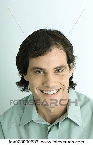 Man smiling at camera, portrait View Large Photo Image Stock Photo - Man smiling at camera, portrait. Fotosearch