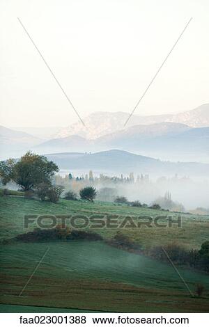 Misty mountain landscape View Large Photo Image Stock Photo - Misty mountain landscape. Fotosearch