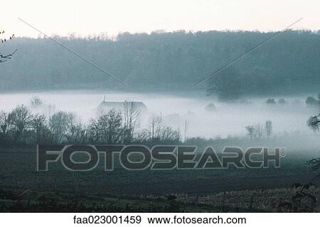Stock Photo - Misty rural landscape. Fotosearch