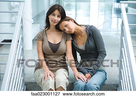 Mother with teenage daughter resting head on her shoulder View Large Photo Image Stock Photo - Mother with teenage daughter resting head on her shoulder. Fotosearch