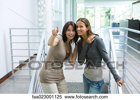 Mother with teenage daughter resting head on her shoulder View Large Photo Image Stock Photography - Mother with teenage daughter resting head on her shoulder. Fotosearch