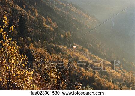 Mountainside in sunlight View Large Photo Image Stock Image - Mountainside in sunlight. Fotosearch