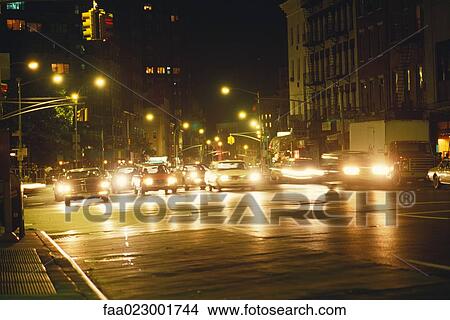 New York, New York, USA, cars pulling out from stoplight at night View Large Photo Image Picture - New York, New York, USA, cars pulling out from stoplight at night. Fotosearch