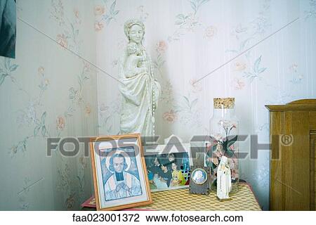 Night stand covered with religious objects and photos View Large Photo Image Stock Image - Night stand covered with religious objects and photos. Fotosearch