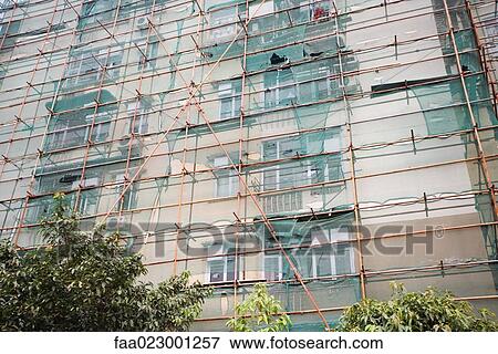 Scaffolding on apartment building View Large Photo Image Stock Photo - Scaffolding on apartment building. Fotosearch