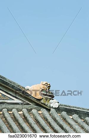 Sculpted figure on roofline of Chinese temple View Large Photo Image Stock Image - Sculpted figure on roofline of Chinese temple. Fotosearch