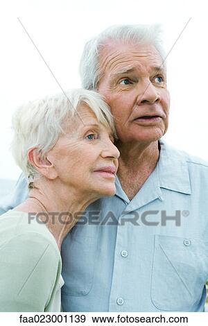 Senior couple looking to distance, portrait View Large Photo Image Stock Photo - Senior couple looking to distance, portrait. Fotosearch