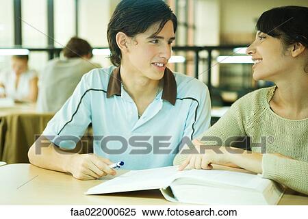 Students studying together in university library View Large Photo Image Stock Photography - Students studying together in university library. Fotosearch