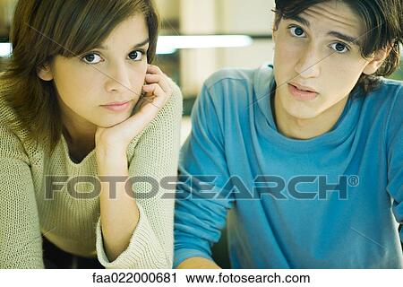 Students studying together, looking at camera, portrait View Large Photo Image Stock Image - Students studying together, looking at camera, portrait. Fotosearch