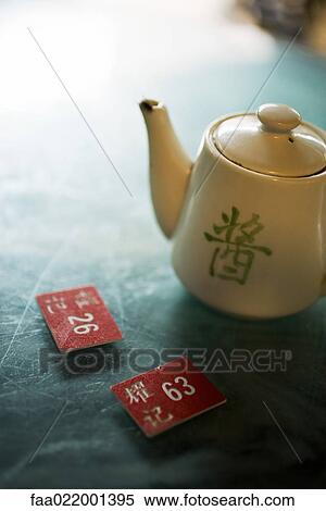 Teapot and table markers View Large Photo Image Stock Photography - Teapot and table markers. Fotosearch