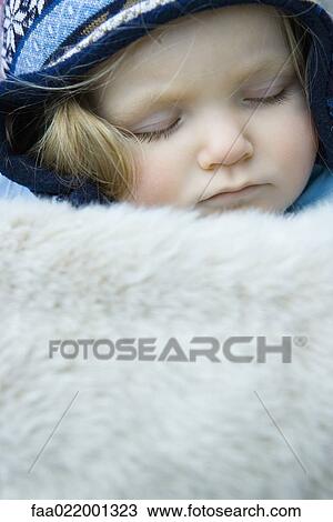 Toddler girl, sleeping under fur blanket, portrait View Large Photo Image Stock Image - Toddler girl, sleeping under fur blanket, portrait. Fotosearch