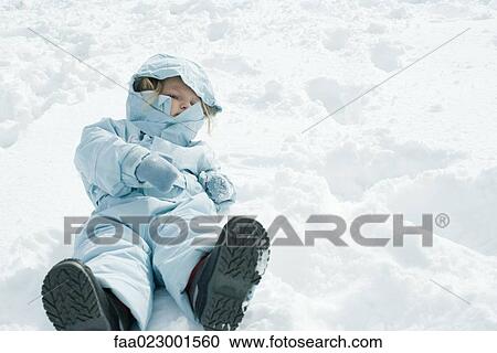 Toddler on back in snow, sitting up View Large Photo Image Stock Image - Toddler on back in snow, sitting up. Fotosearch