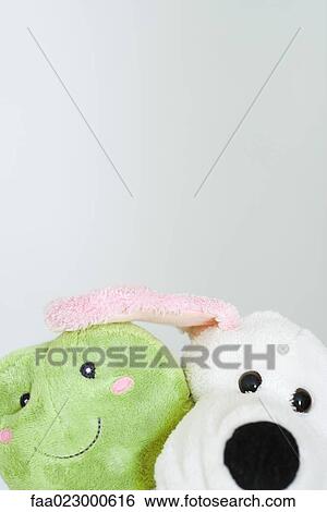 Two stuffed toys, portrait, cropped view View Large Photo Image Stock Photograph - Two stuffed toys, portrait, cropped view. Fotosearch