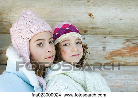 Two young friends smiling at camera, portrait View Large Photo Image Picture - Two young friends smiling at camera, portrait. Fotosearch