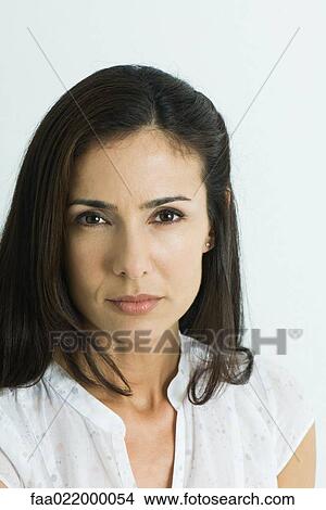 Woman looking at camera, portrait View Large Photo Image Picture - Woman looking at camera, portrait. Fotosearch