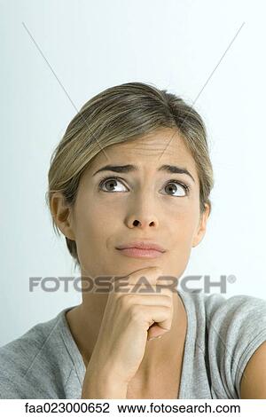 Woman looking up, portrait View Large Photo Image Stock Image - Woman looking up, portrait. Fotosearch